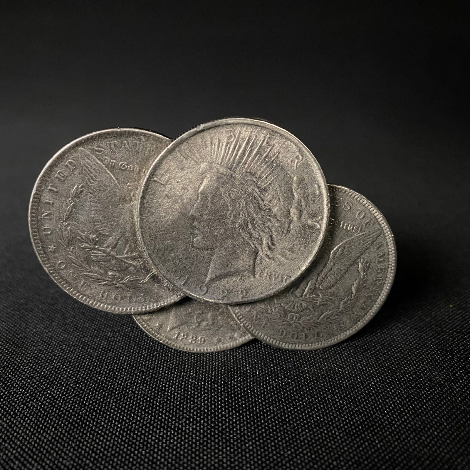 The Great American Buckles Co. Silver Dollar Belt Buckle: The Great American Buckles Co. Silver Dollar Belt Buckle. Condition is excellent with no damage and minimal surface wear and grime. Back Marked Made in USA, Copyright 1982, H1013, The Great American B