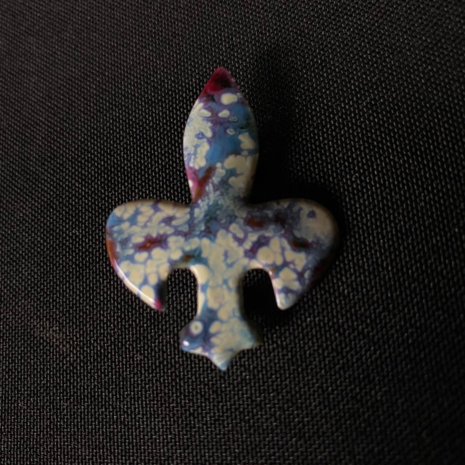 Signed Fleur De Lis Pin with Enamel Over Copper: Signed Fleur De Lis Pin with Enamel Over Copper. Condition is excellent with no chipping to the enamel, and minor surface wear. Signature on back, unable to identify the signature. (see photos). The e