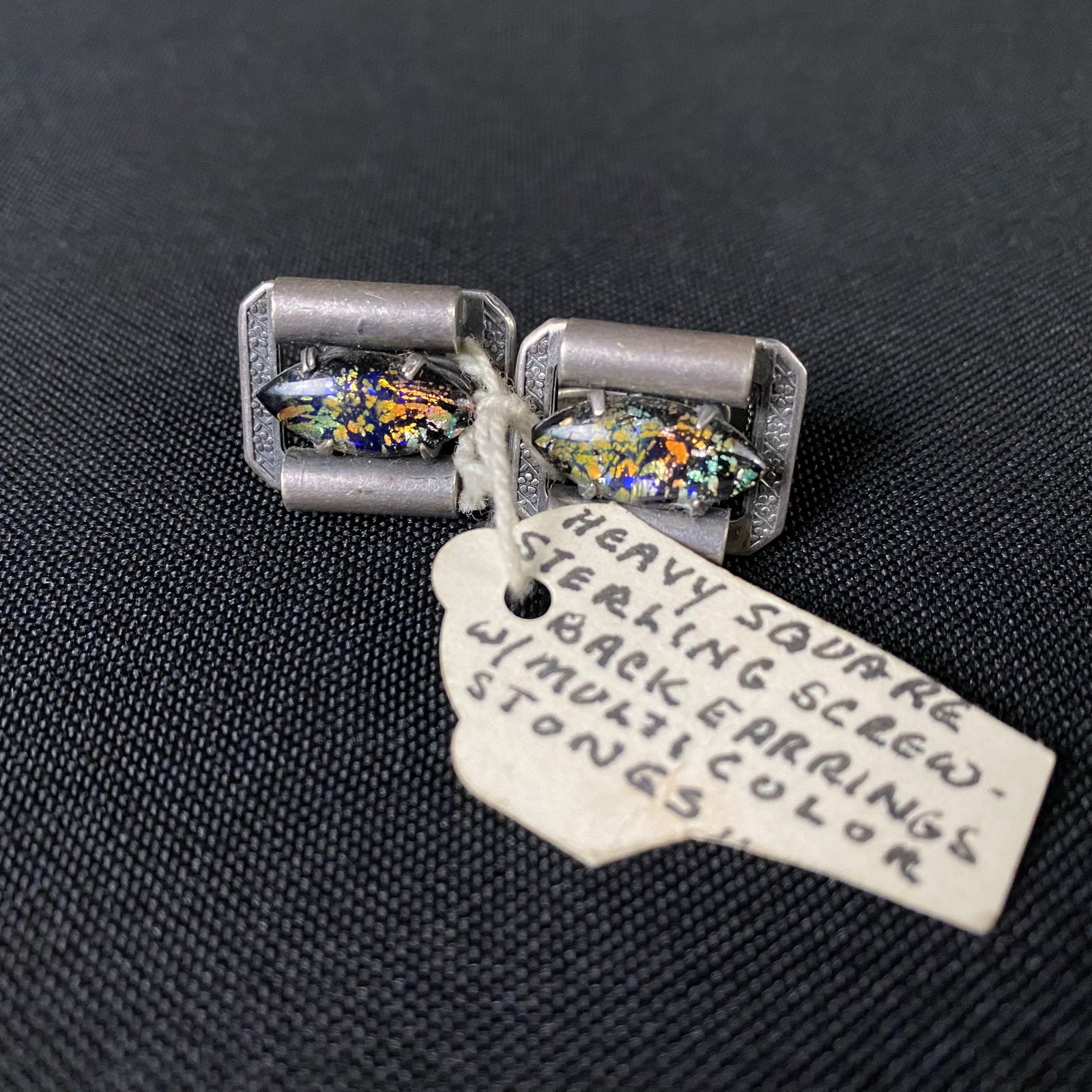 Sterling Silver Square Multicolored Stone or Glass Screw Back Earrings: Sterling Silver Square Multicolored Stone or Glass Screw Back Earrings. They are in excellent condition with minor surface wear and grime. They have a Multi colored stone in the center polished and sh