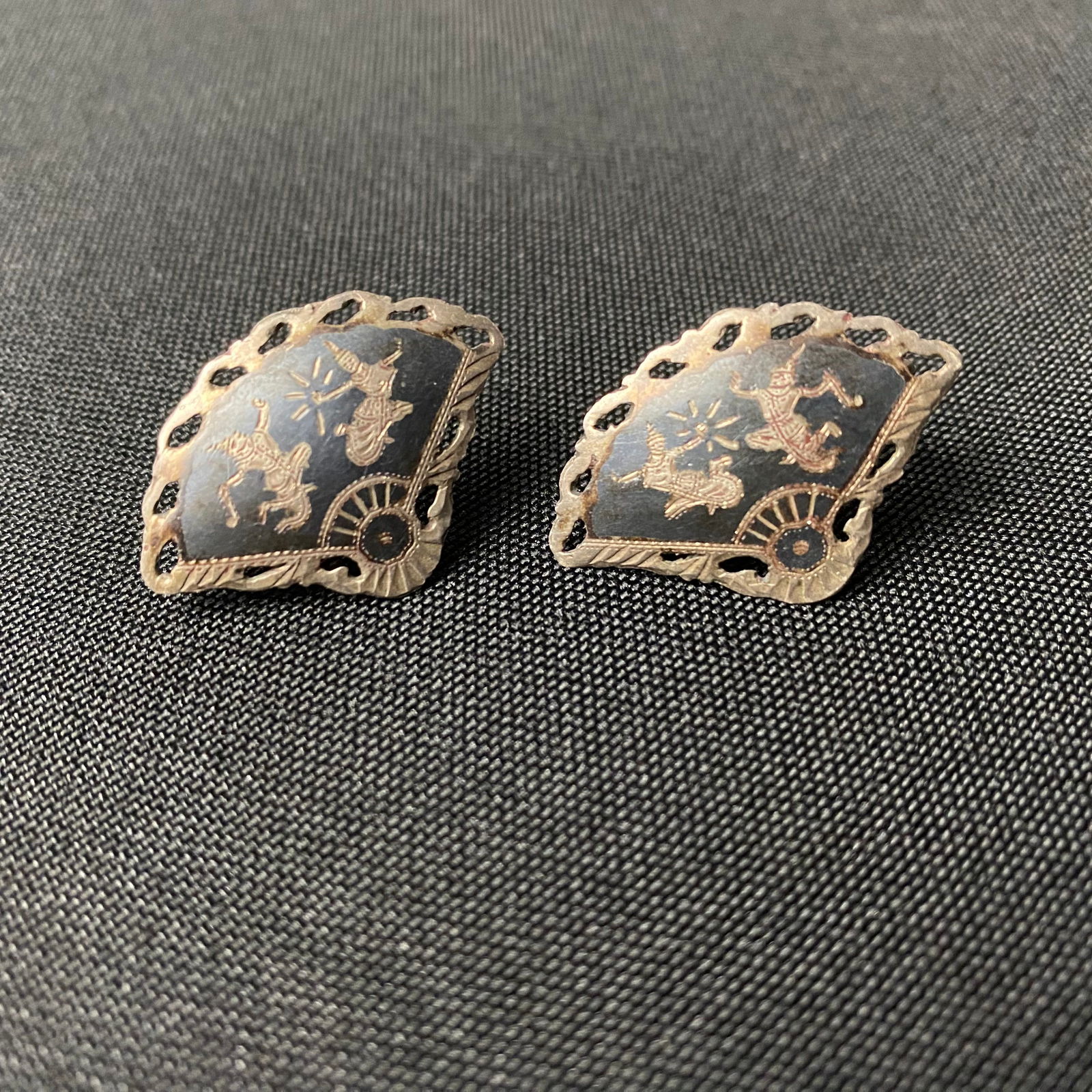 Sterling Silver Hand Fan Shaped Screw Back Earrings: Sterling Silver Hand Fan Shaped Screw Back Earrings. They are in excellent condition with minor surface wear and grime. They have a black enamel finish on the face with silver details engraved, and tw