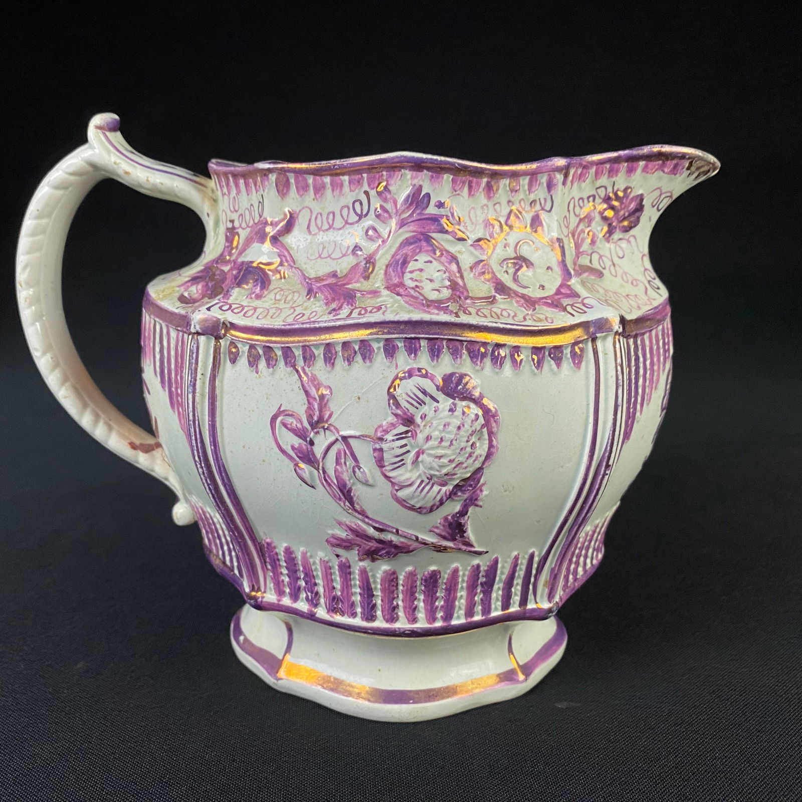 Purple Eagle Lustre Jug: Purple Eagle Lustre Jug. It is in great condition with no breaks, chips or cracks, and some light to medium wear to the glaze, primarily on the bottom and the inner brim. It has a moderate amount of s