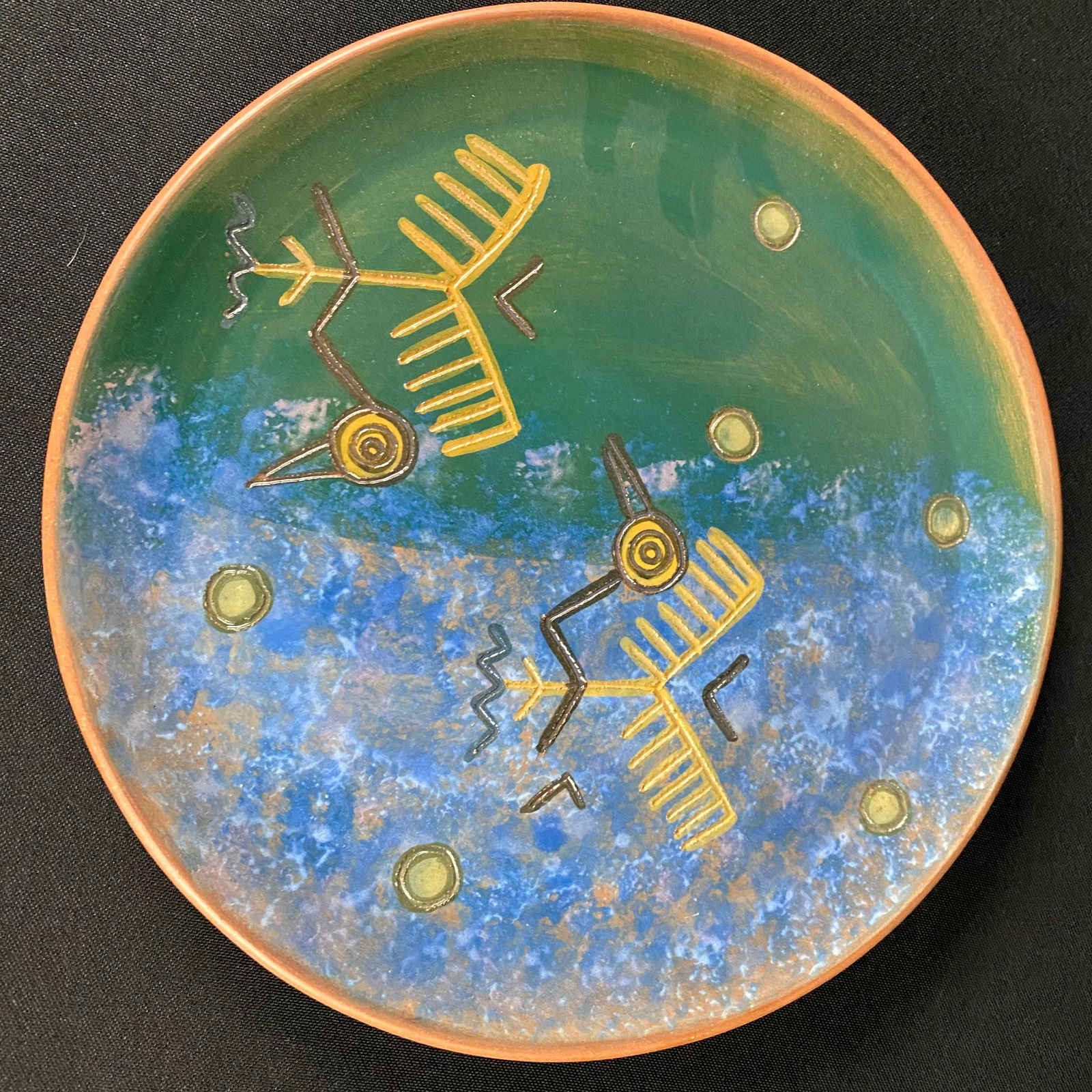 Peruvian Ceramic Wall Hanger Plate by Seminario: Peruvian Ceramic Wall Hanger Plate by Seminario. It is in very excellent condition, with almost no surface wear, with the exception of some scratches to the wood back plate. The glazed finish and desi