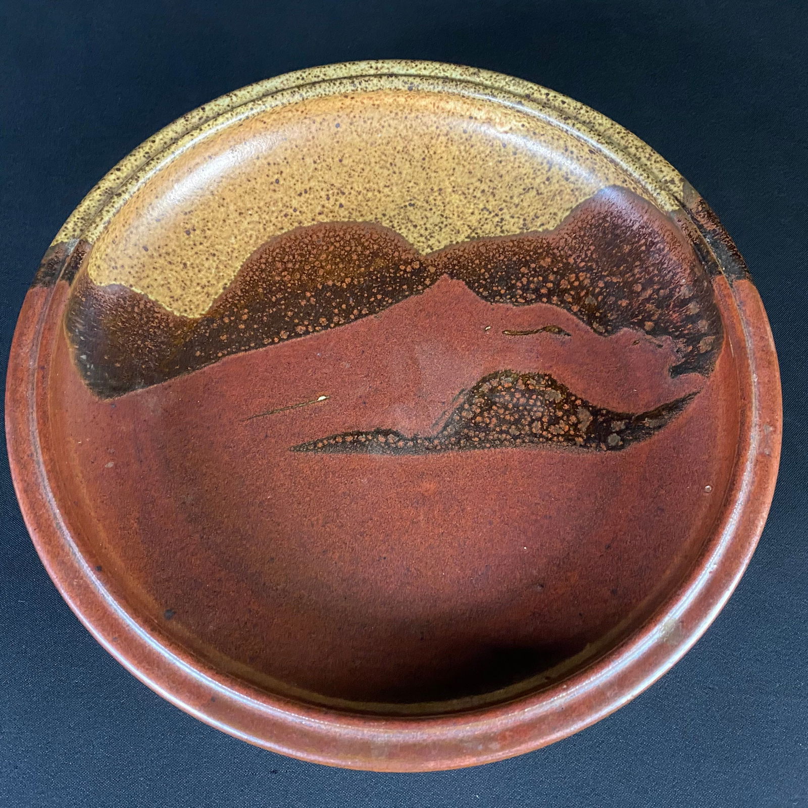Signed Red and Earthtones Stoneware Bowl (1 of 9)