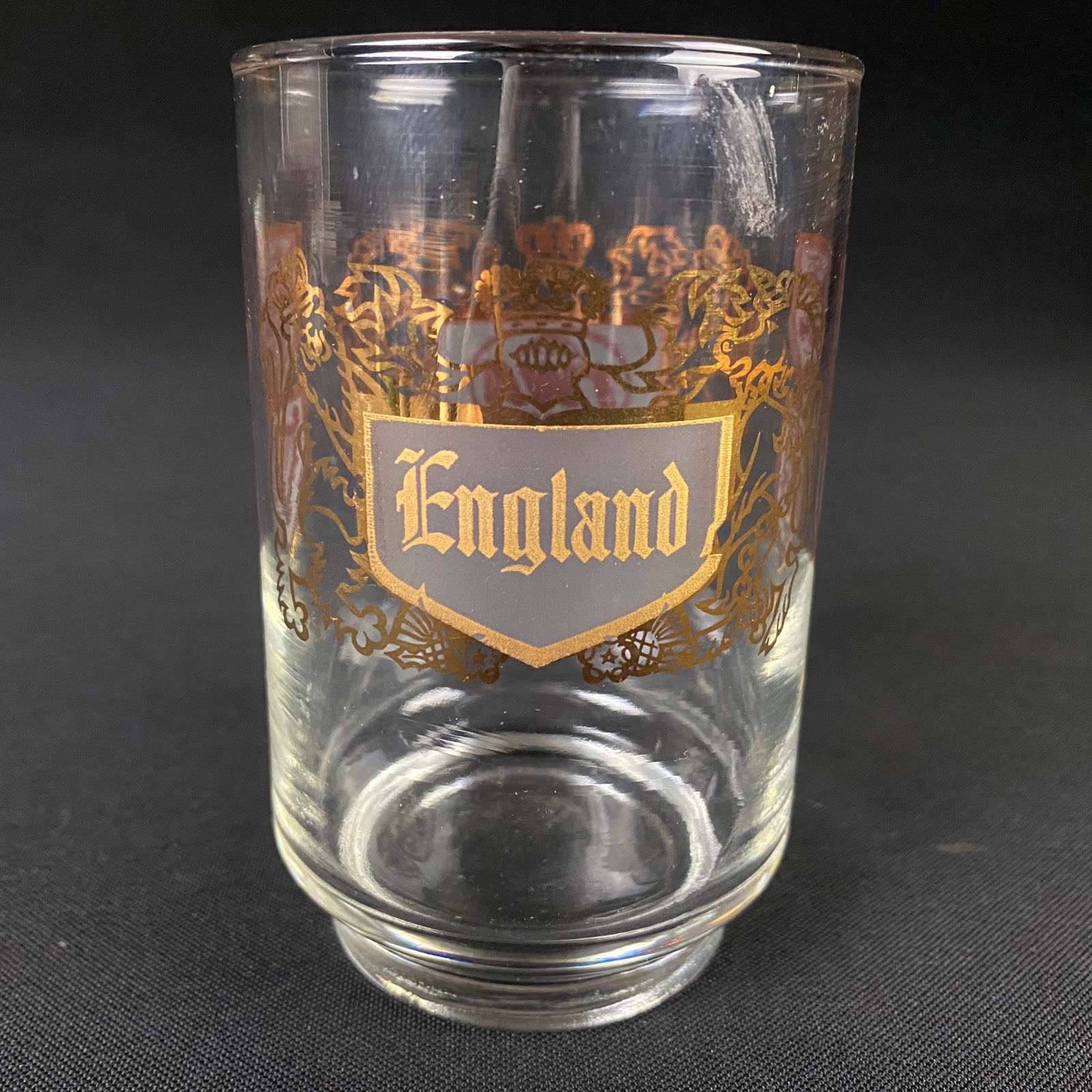 TWA England Countries Series Cocktail Glass: TWA England Countries Series Cocktail Glass. It is in excellent condition with minor surface wear and grime. All the details are still very sharp with little wear. It measures 4 1/2 tall by 2 13/16 in