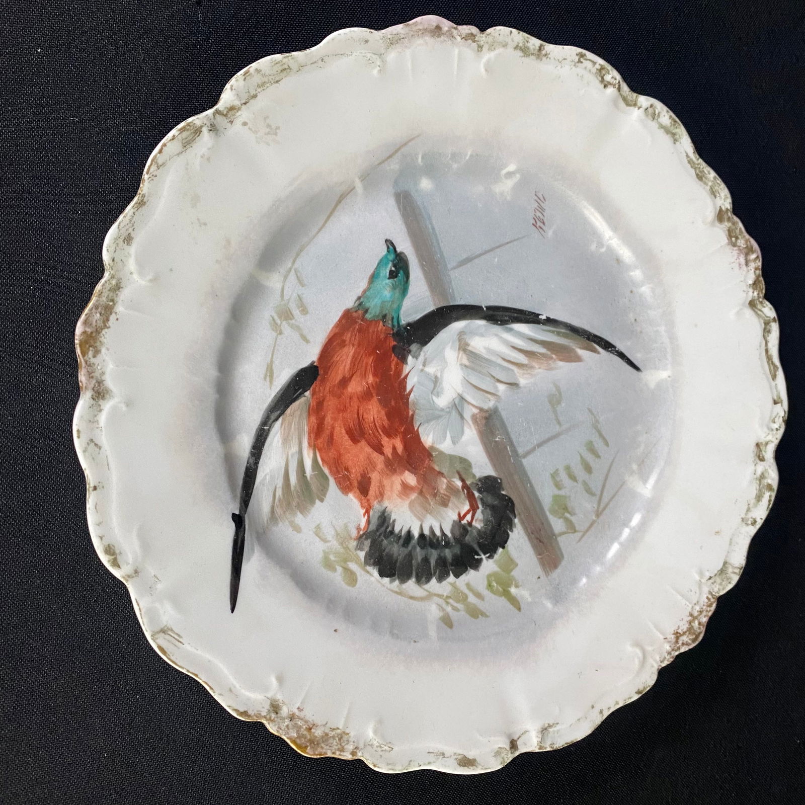 Antique French LDBC Limoges Hand Painted and Signed Bird Plate: Antique French LDBC Limoges Hand Painted and Signed Bird Plate. It is in Great condition with no breaks, chips, or cracks, and mild surface wear including some light scratches and the colored glaze we