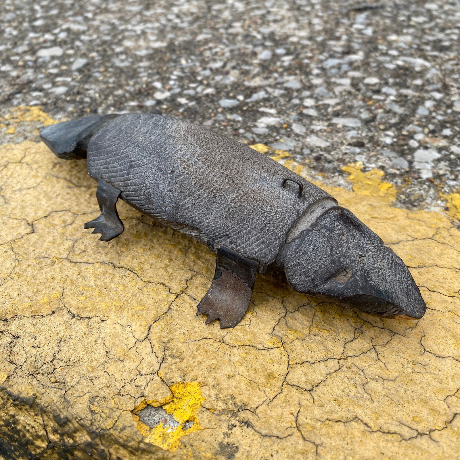 Antique Folk Art Beaver Ice Fishing Lure: Unusual antique ice fishing lure in the form of a beaver, This Folk art carving had lead filled in the belly. The [piece measures app 7.5"x3.25".