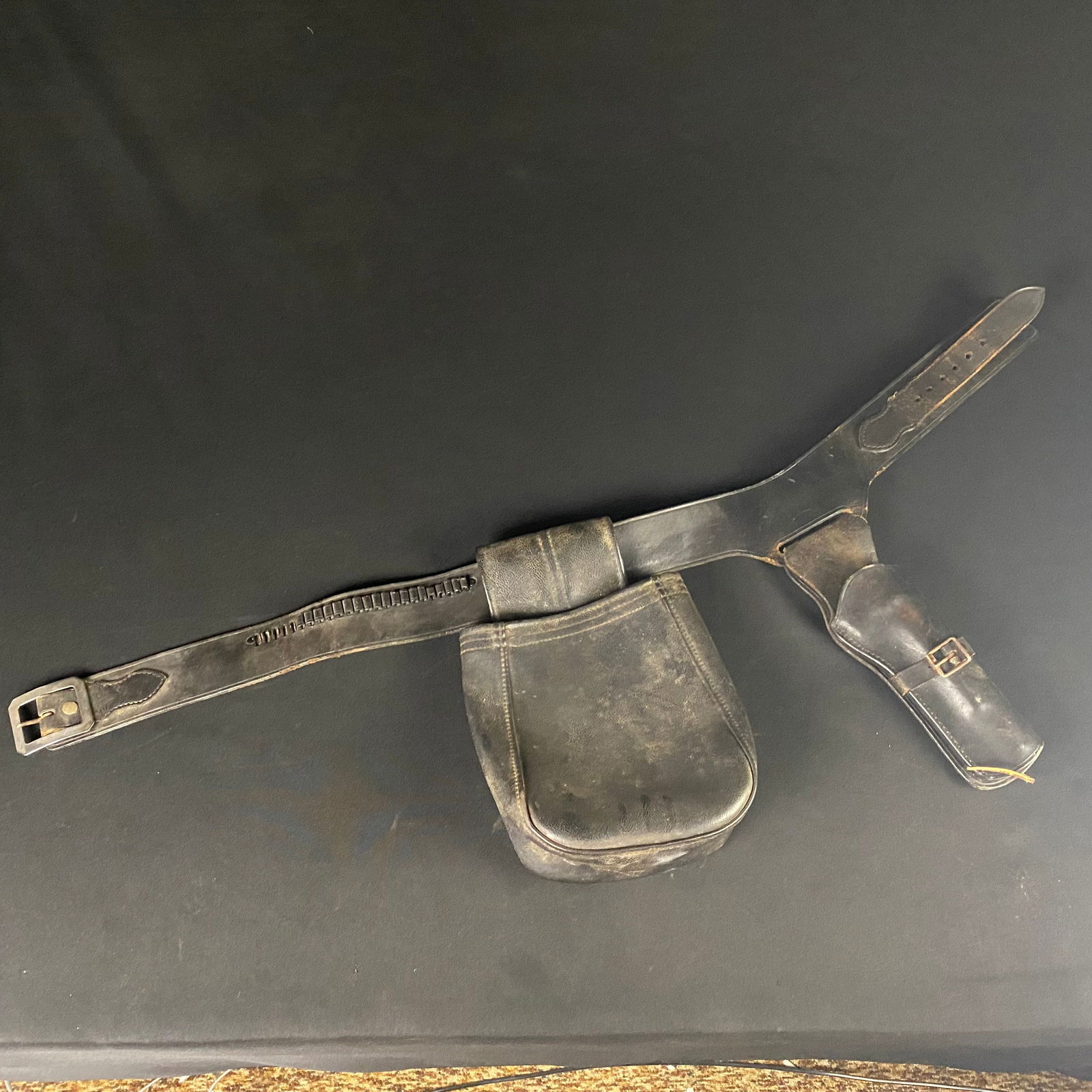 Leather Pistol Holster and Amma Belt With Ammo Bag: Leather Pistol Holster and Amma Belt With Ammo Bag. It is in Great condition with surface wear consistent with age and use, as well as some of the ammo loops on the belt broken off or damaged. It has