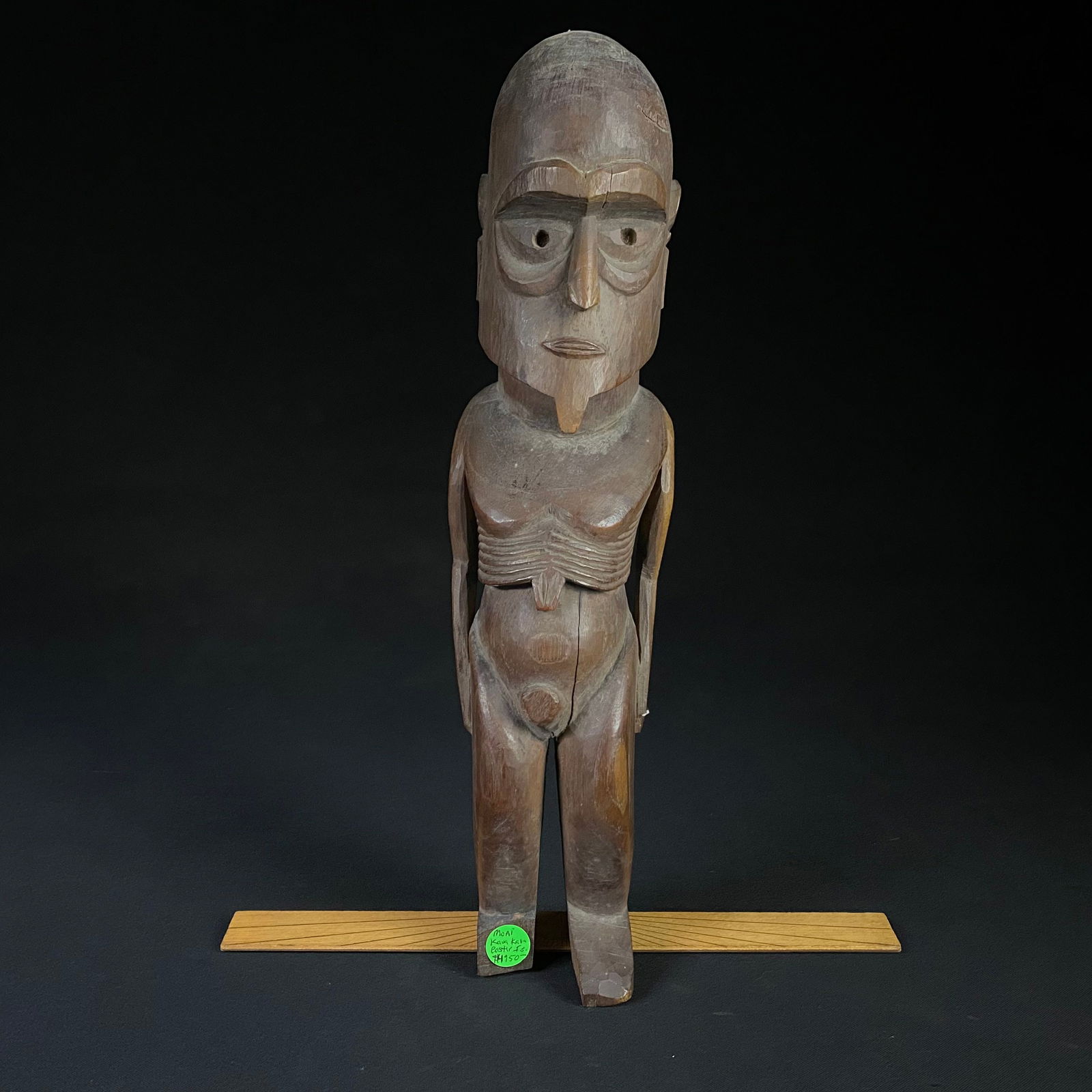 Hand Carved Moai Kava Kava Easter Island Wooden Statue: Hand Carved Moai Kava Kava Easter Island Wooden Statue. It is in good condition with minor damages and cracks. The statue does not stand freely and needs a small bas under the heels for it to balance