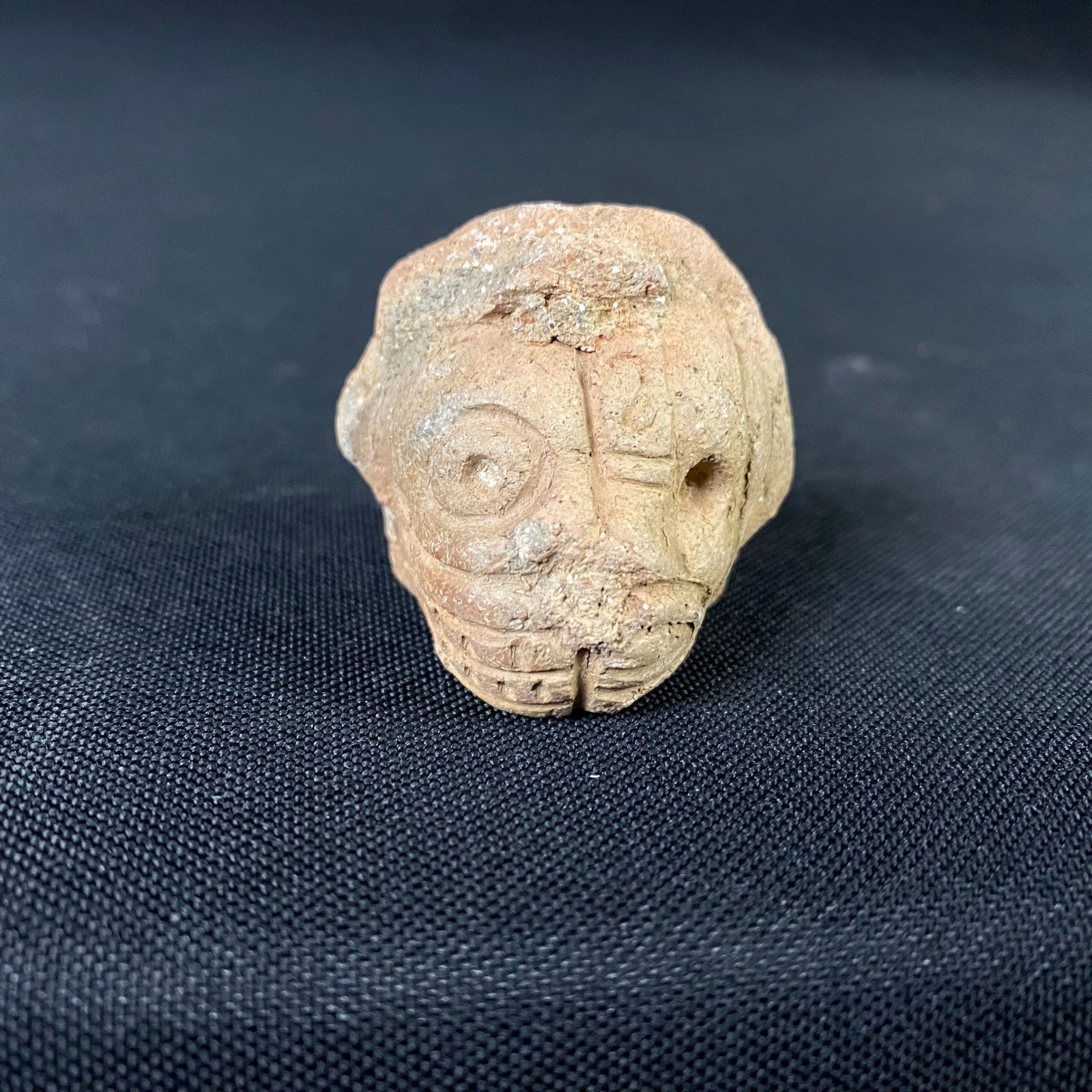 Pre Columbian Mayan Jaguar Head Stoneware Statue: Pre Columbian Mayan Jaguar Head stoneware Statue. It is in good condition with minor surface damage and wear including some small chips and dings. The face design is split down the center with one sid