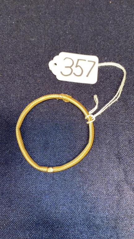 14k yellow gold hinged bangle bracelet. Has (1 of 3)