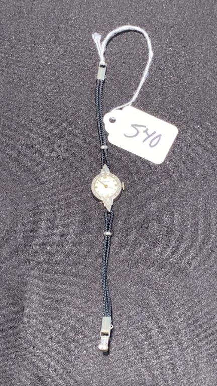 ROBERT CART PLATINUM LADIES WRIST WATCH: SIGNED 900 PLAT