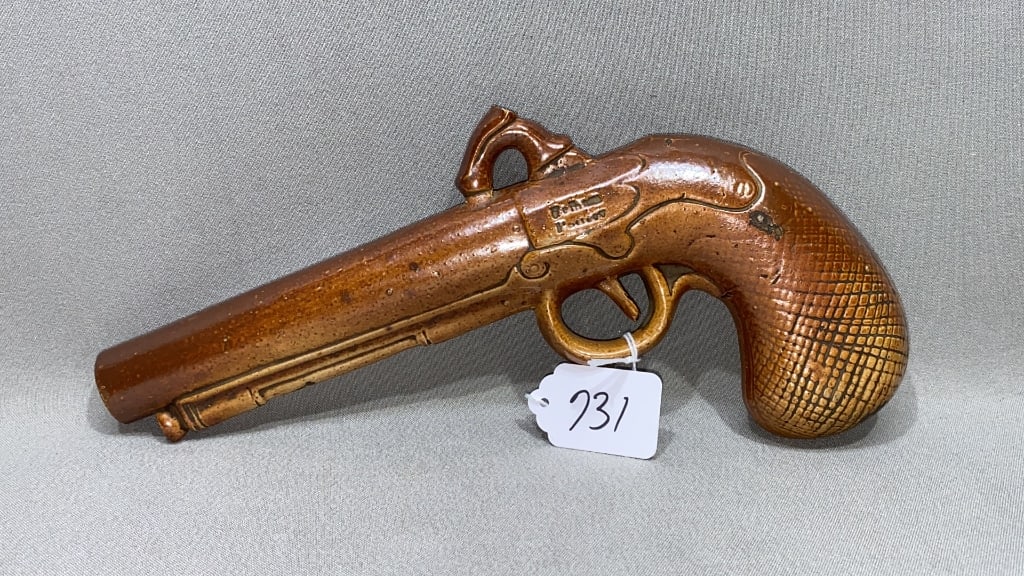 ANTIQUE POTTERY GUN FORM DRINKING FLASK: 10"