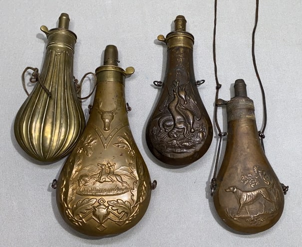 4 ANTIQUE BRASS POWDER FLASKS (1 of 5)