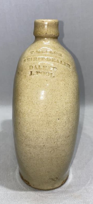 T MELLOR SPIRIT DEALER STONEWARE BOTTLE: ~