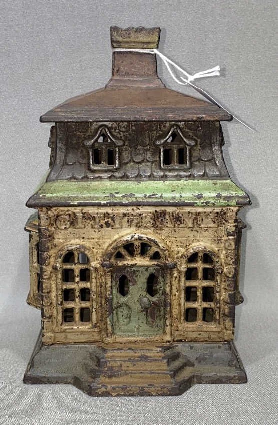 CAST IRON "CITY BANK" STILL BANK (1 of 4)