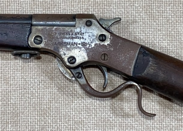 STEVENS MARKSMAN-12 .25 CALIBER RIFLE: THIS FIREARM REQUIRES A $40 BACKGROUND CHECK BEFORE IT CAN CHANGE HANDS. PAYMENT WILL BE MADE DIRECTLY TO THE FFL DEALER. IT CAN BE PICKED UP AT THE AUCTION ON AUCTION DAY OR AT MOLLY'S IN KENEDYVILLE