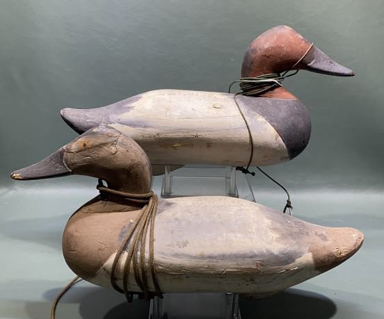 PAIR UPPER BAY CANVASBACK DECOYS: IN REPAINT & BRANDED "O"