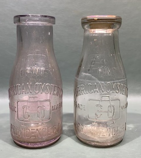 2 AMERICAN OYSTER CO. 1 PINT BOTTLES: ~