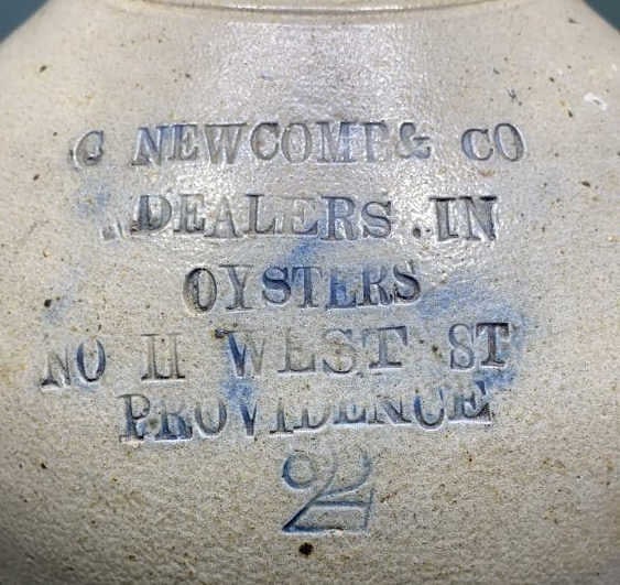 C NEWCOMB & CO 2 GAL. OYSTER CROCK: C NEWCOMB & CO "OYSTER" STONEWARE CROCK NOII WEST ST. PROVIDENCE ~ 13 1/2"