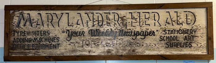 "MARYLANDER & HERALD" WOOD SIGN