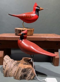 PAIR OF GARY DAISY CARVED CARDINALS