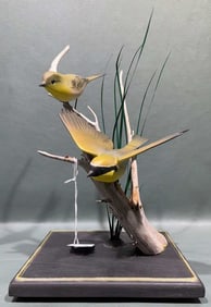 H MENARD CARVED PAIR OF DECORATIVE BIRDS