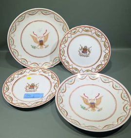 PAIR OF ARMORIAL CHARGERS & PLATES