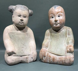 PAIR OF CARVED WOODEN ORIENTAL FIGURES