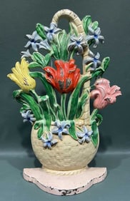 ANTIQUE CAST IRON FLOWER BASKET DOORSTOP
