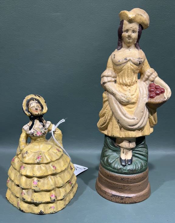 2 ANTIQUE CAST IRON WOMEN DOORSTOPS: 7 3/4" TALL