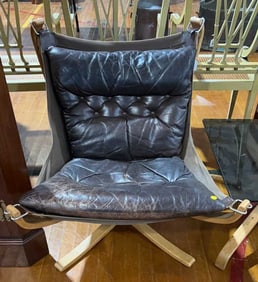 VINTAGE LEATHER FALCON CHAIR