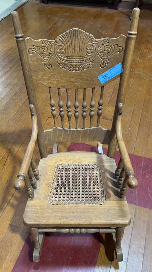 ANTIQUE OAK CHILDS PRESS BACK ROCKING CHAIR: ~ 29" X 23" X 13" (all sizes are approximate for shipping calculations for detailed sizes please contact us)