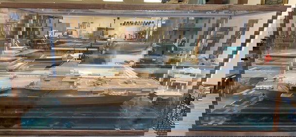 LARGE AIRCRAFT CARRIER SHIP MODEL IN SHOWCASE