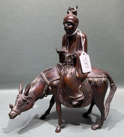 CHINESE BRONZE CENSER OF MAN ON DONKEY