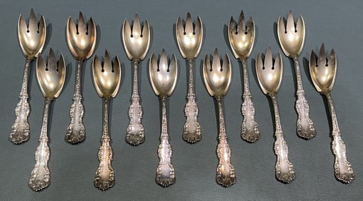 12- STERLING ICE CREAM SPOONS