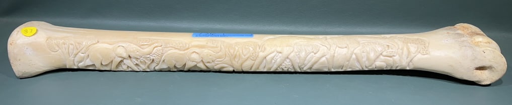 AFRICAN CARVED BONE WITH AFRICAN SCENE: 26" LONG