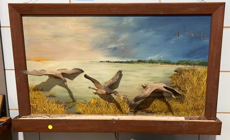 FLYING METAL MALLARDS ON PAINTED BOARD
