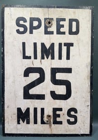 PAINTED SPEED LIMIT SIGN ON WOOD