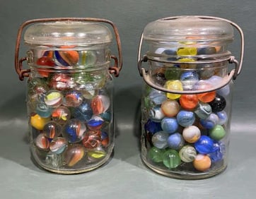 2 JARS OF MARBLES