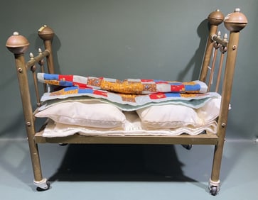ANTIQUE BRASS DOLL BED