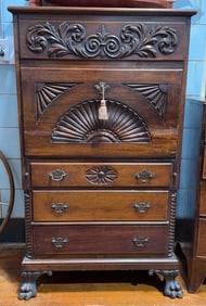 CARVED MAHOGANY BUTLER'S TALL CHEST