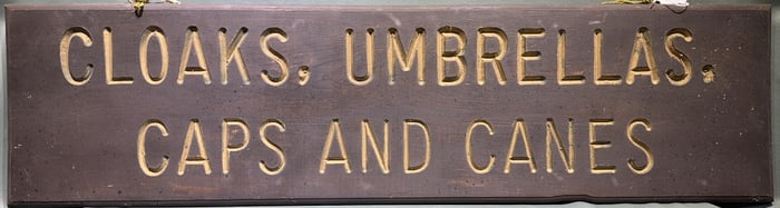 "CLOAKS, UMBRELLAS, CAPS, & CANES" WOODEN SIGN