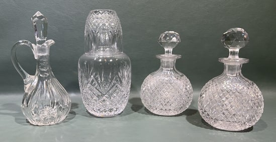 COLLECTION OF VARIOUS CUT CRYSTAL BOTTLES
