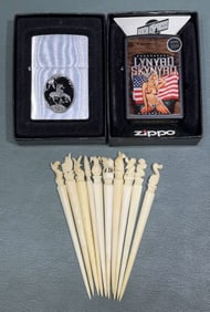 2 ZIPPOS & TOOTH PICK LOT