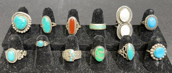 COLLECTION OF 12 STERLING NATIVE AMERICAN RINGS