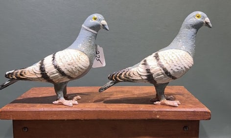 PAIR OF CAST IRON STANDING PIGEONS