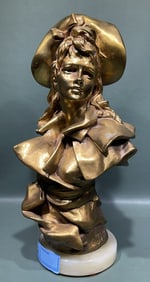 BRONZE BUST OF A LADY ON A MARBLE BASE