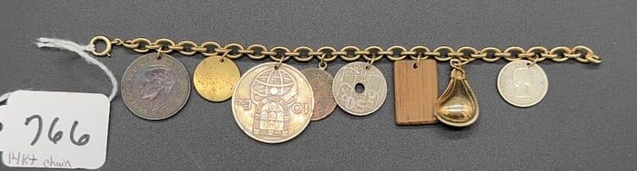 14KT GOLD BRACELET W/VARIOUS COIN CHARMS
