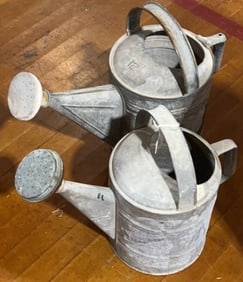2 VINTAGE WATERING CANS