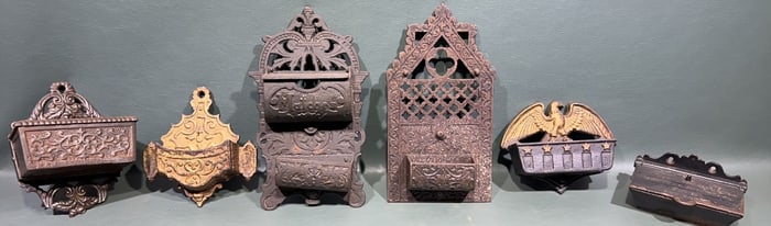 COLLECTION OF VARIOUS CAST IRON MATCH SAFES